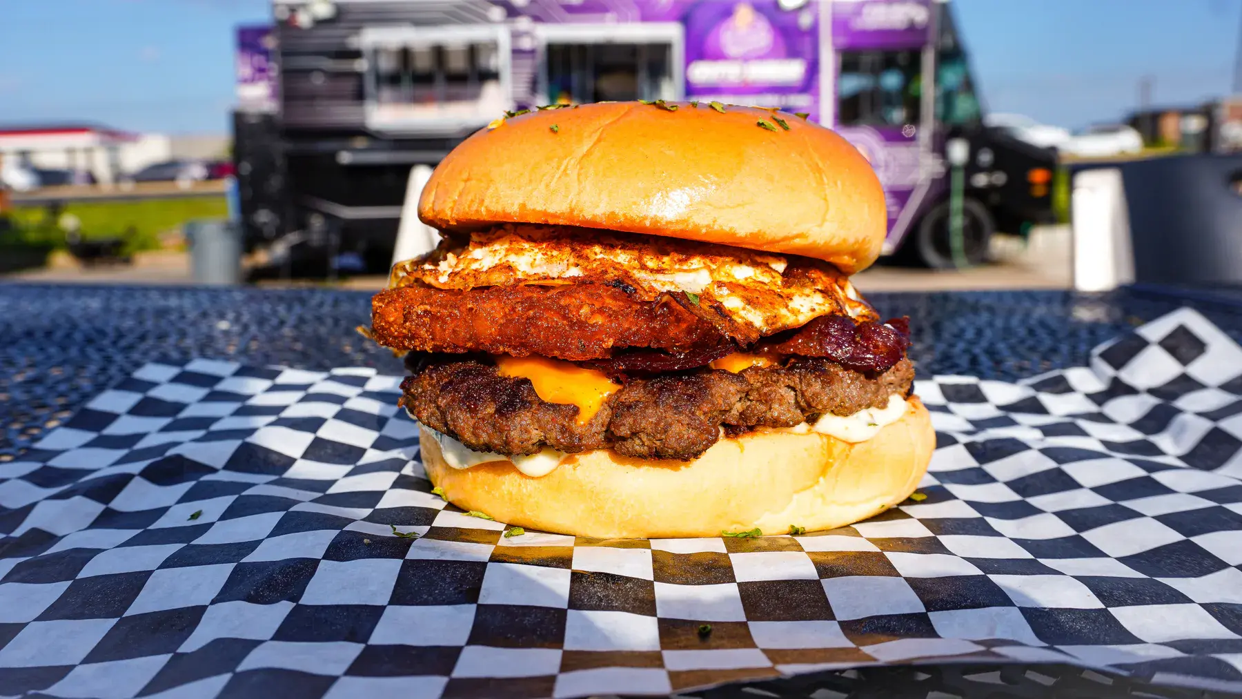 The Brekky breakfast burger with egg, hash brown, halal bacon, and FOMO sauce