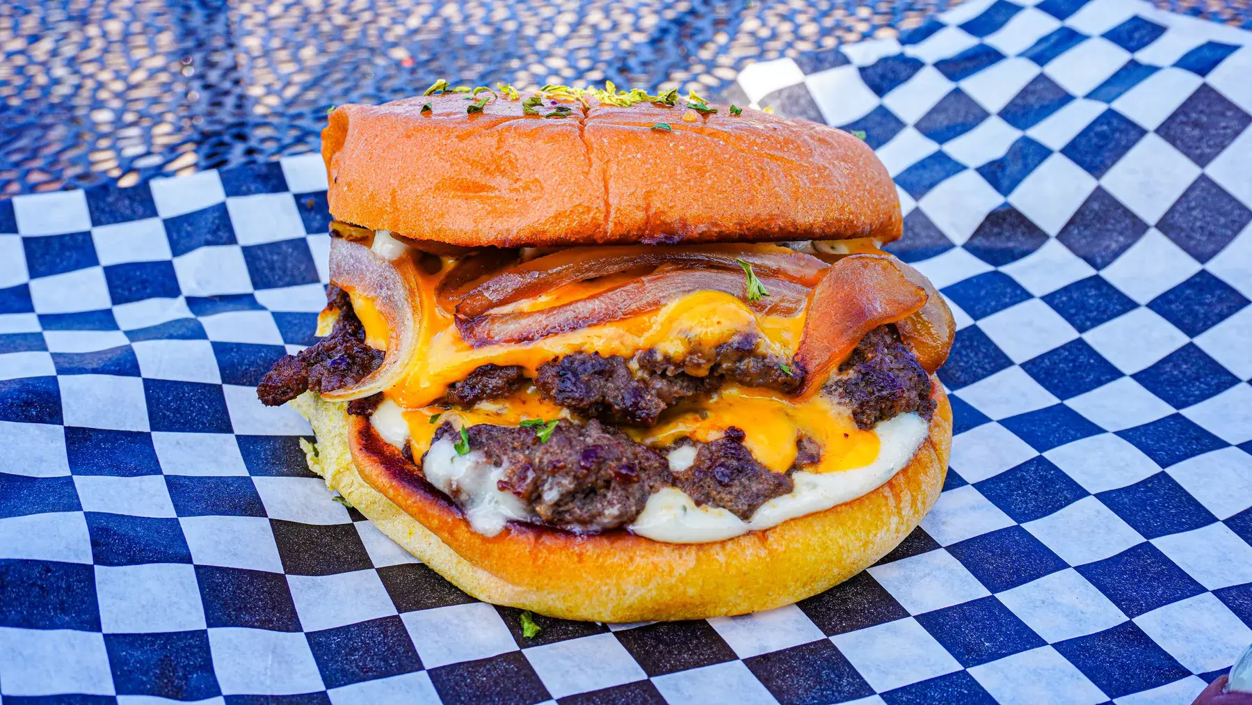 Double Crypto Smash burger with grilled onions and cheese