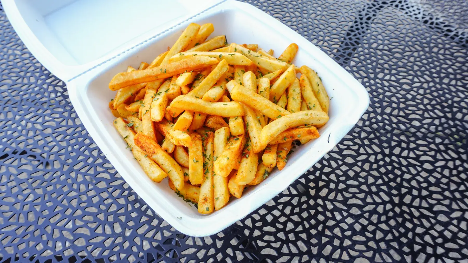 Fresh seasoned side of fries from Crypto Burger